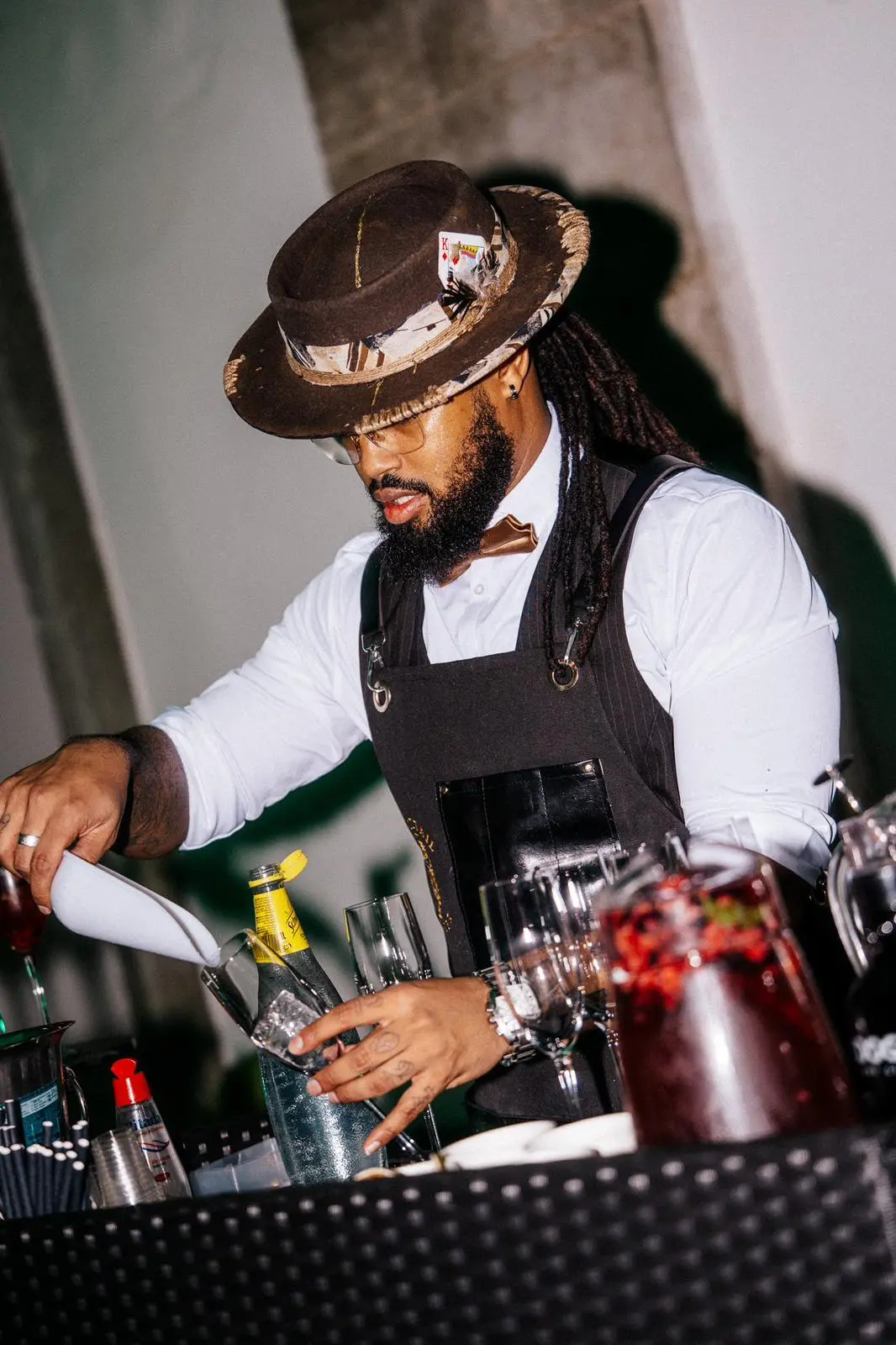 Cocktail Master bartender preparing drinks at a private event